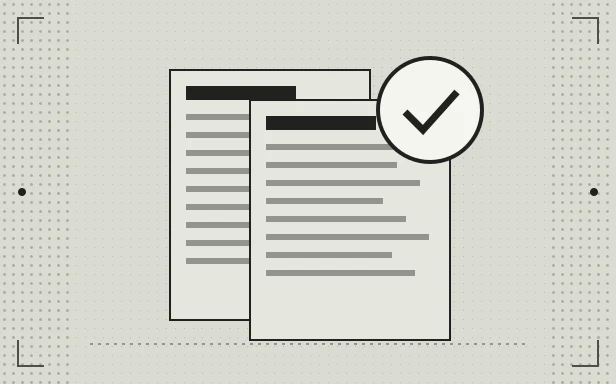 Two printed pages with a check mark